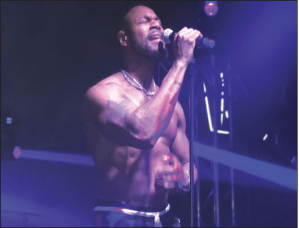 Tank pulled his signature shirtless stage move. 