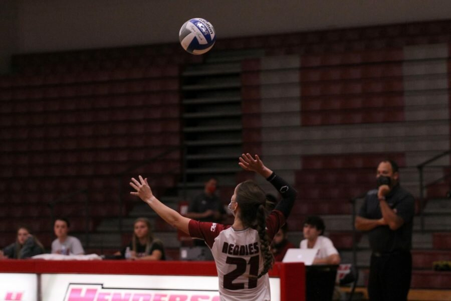 Junior setter Taylor Scalzi serving during the Reddies match against SAU.