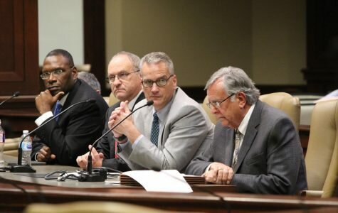 Former HSU president Dr. Glen Jones, secretary board member Eddie Arnold, former vice president of finance and administration Dr. Brett Powell, and chairman board member Johnny Hudson sit before lawmakers as they are questioned regarding Henderson’s financial situation.