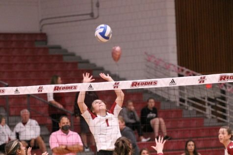 Madison Hatt sets up the attack for the Reddies in their match versus Southern Nazarene.